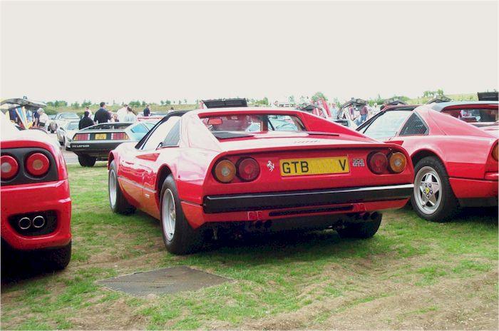 Delorians, Countachs and TVRs in background